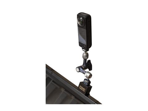 Camera adapter clamped to a console edge holding a 360 camera on an arm