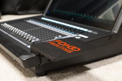 Mouse pad clipped to the side of a Waves LV1 console