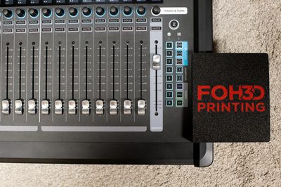 Top-down view of the mouse pad beside the LV1 faders